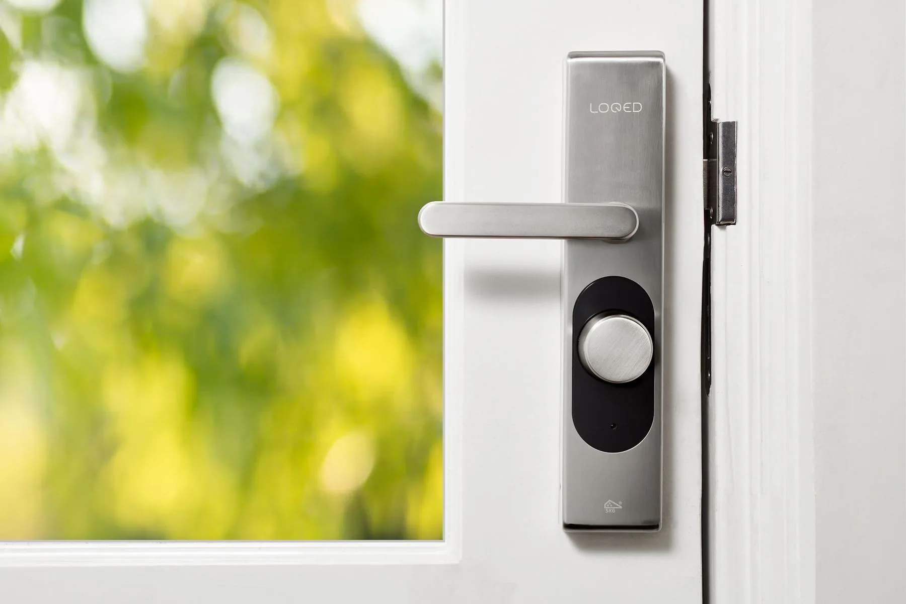 Smart digital door lock installed on a bright Singapore home door