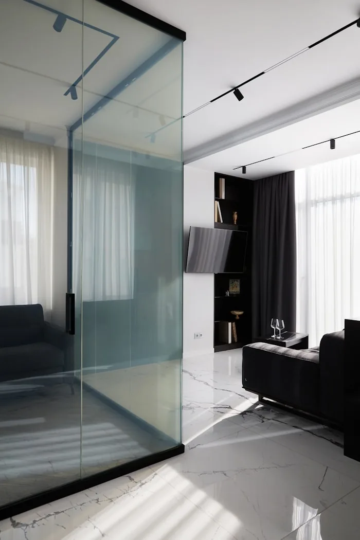 Glass partition wall in a modern Singapore living room