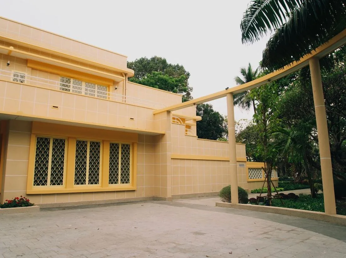 A landed house in Singapore with its own gate and front door, two layers a door viewer camera sits behind