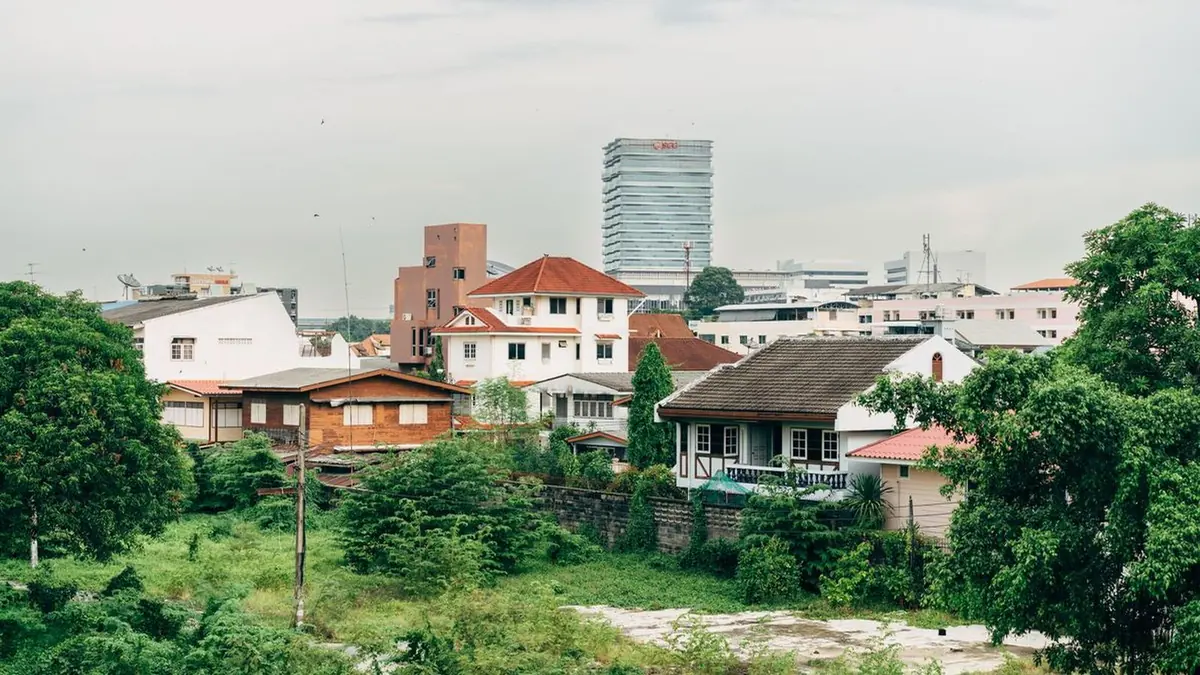 A landed estate in Singapore, with long gate runs and full-sun pillars