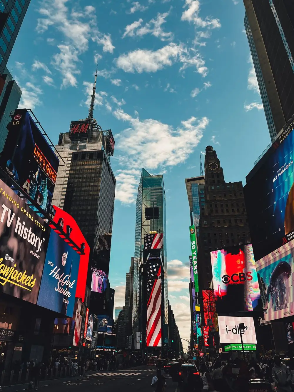 Large outdoor LED displays on building facades in daylight